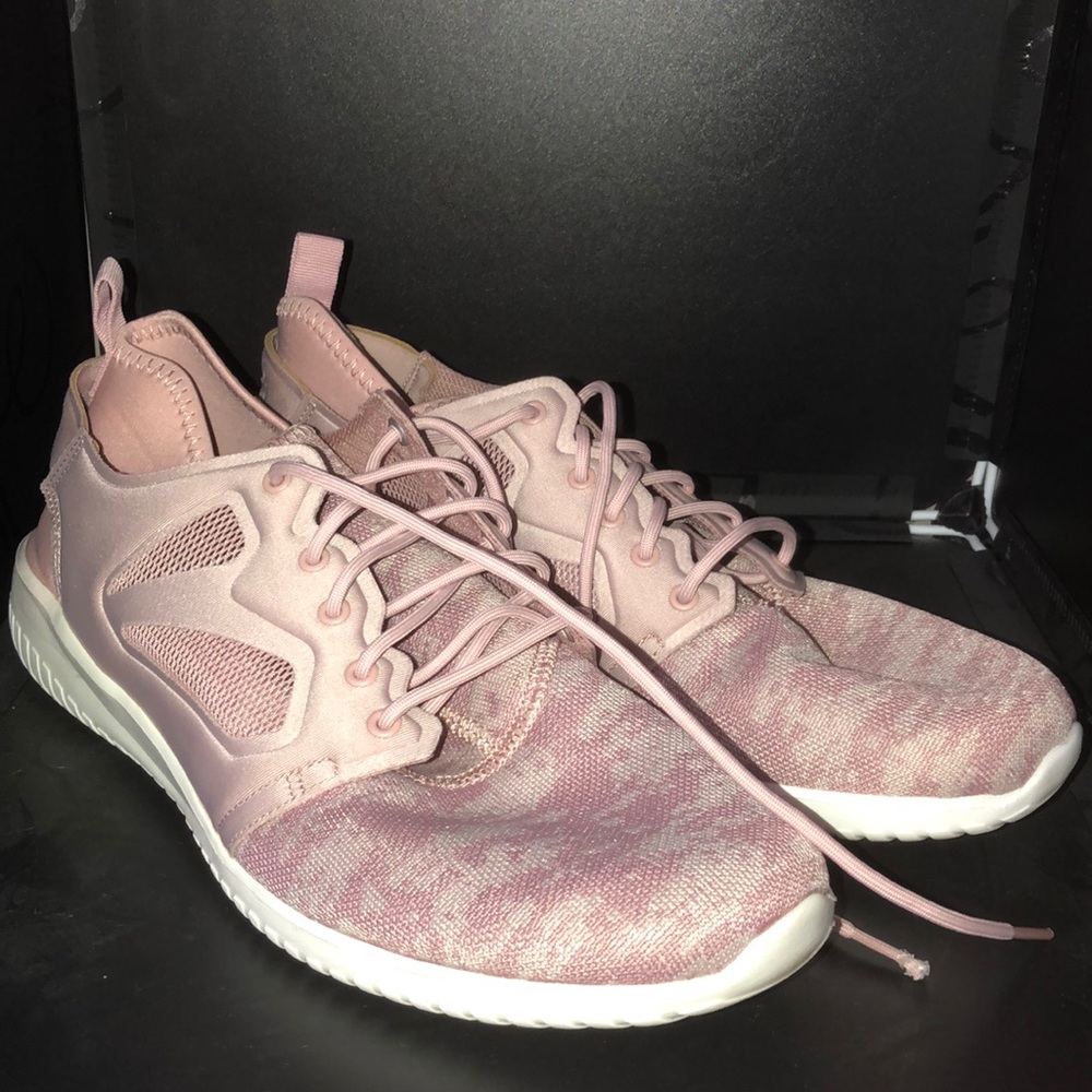 Womens pink fabric Reebok sneakers.